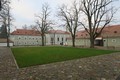 Zámek a stáje naproti faře