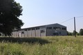 Nynější jízdárna poblíž historického zámku a hřebčína