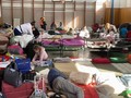 Uprchlíci v tělocvičně v obci Ubľa (Ivan Vilček, Právo)
