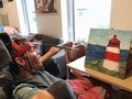 Tomáš Rybička maluje hlavou a nyní vystavuje své obrazy na krajském úřadu